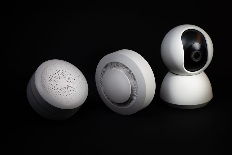 Elegant and innovative home automation devices on a sleek black background, showcasing modern technology.